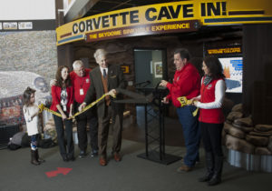 Cutting the ribbon are (from l-r) Katie Frassinelli, Museum Marketing Manager; Wendell Strode, Museum Executive Director; Roger Barganier, President of Creative Arts Unlimited; Bob Hellmann, Museum Facilities Manager and Christy Thomas, Museum HR/Finance Director